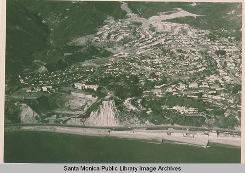 Aerial view of coastline and the Bel Air Bay Club site, Pacific Palisades, Calif., February 15, 1959