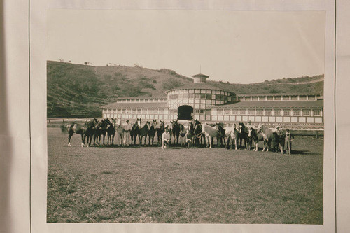 Horses lined up in front of the Main Stables at Will Rogers Ranch in Rustic Canyon (Jim Rogers, far right and Will Jr, middle)