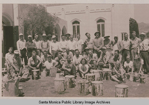 Volunteers and workers are gathered for the painting of the sanctuary of the Methodist Church, Pacific Palisades, Calif