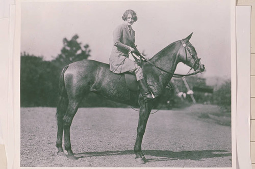 Bundy family member on horseback at Uplifter's Ranch in Rustic Canyon, Calif