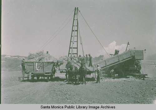 Men harvesting hay in Pacific Palisades, Calif