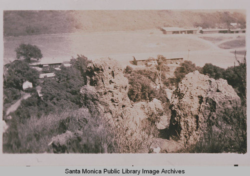 Looking down on the first Palisades houses from rock formations in Temescal Canyon, Pacific Palisades, Calif