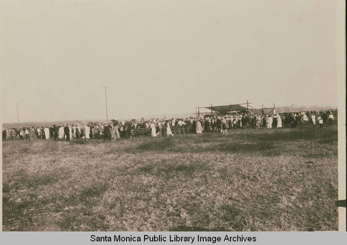 A very long shot of the founding of the Chatauqua camp in Temescal Canyon with participants seen in the distance