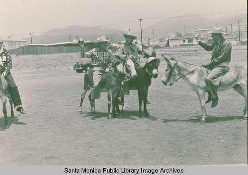 Cowboys on donkeys, Fiesta Day, Pacific Palisades, Calif