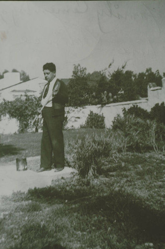 Member of the Marquez Family stands in the Marquez Cemetery, Santa Monica Canyon