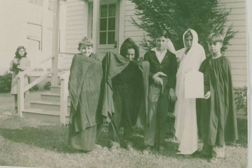 Children dressed in costumes in front of Canyon School in Santa Monica Canyon