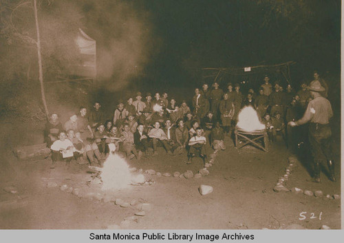 Boy Scouts by a camp fire, summer 1922, Temescal Canyon, Calif