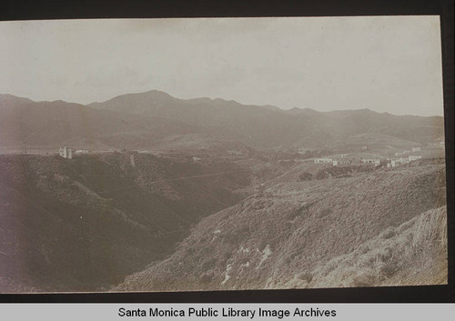 Homes line a canyon rim in Pacific Palisades, Calif