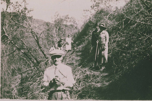 Bill Blanchard (foreground) and others hiking in Temescal Canyon, Calif