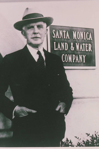 R.C. Gillis in front of Santa Monica Land and Water Company in Santa Monica, Calif