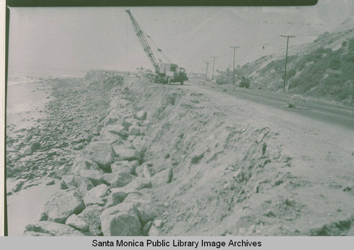 Protecting the Pacific Coast Highway at Sunset Blvd. by constructing a barrier of rocks