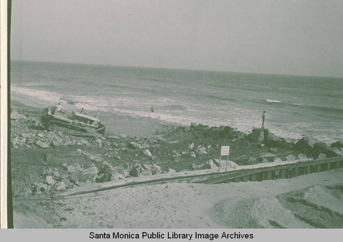 Protecting the Pacific Coast Highway at Sunset Blvd. by constructing a barrier of rocks