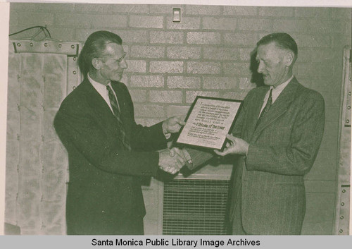 Pacific Palisades first Citizen of the Year Awards presentation with Cifford Clearwater (left) handing the award to Robert Wilson (right)