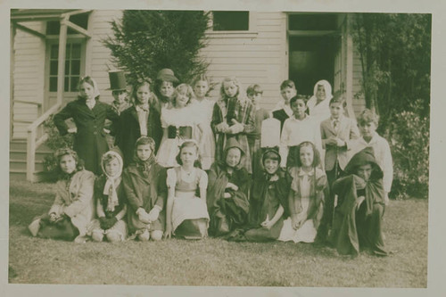 Children in costumes in front of Canyon School in Santa Monica Canyon