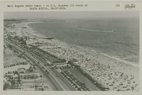 A crowded Will Rogers State Beach along Pacific Coast Highway looking south to Santa Monica, Calif