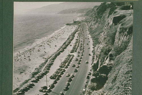 Roosevelt Coast Highway (later known as Pacific Coast Highway) looking north to the lighthouse and Santa Monica Mountains