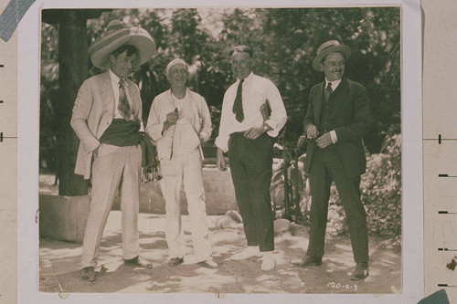 Will Rogers and others in a movie production still photo