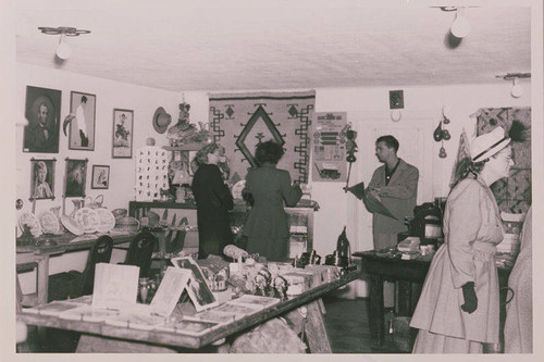 Visitors tour the curio shop at the guesthouse at Will Rogers Ranch State Park, Rustic Canyon, Calif