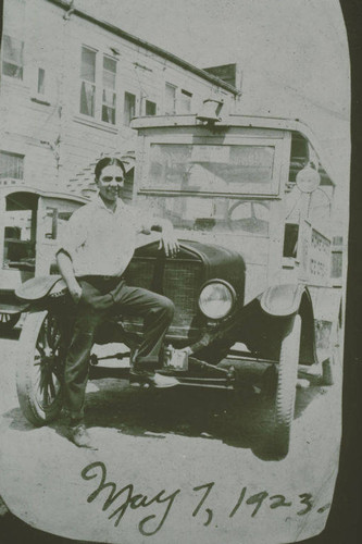 Marquez Family member with his autombile at the Bundy Bath House in Santa Monica Canyon