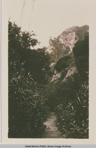 Trail in Upper Temescal Canyon with Split Rock and Chico conglomerate in the background