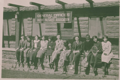 Group with tennis gear in front of the Pacific Palisades Association General Offices