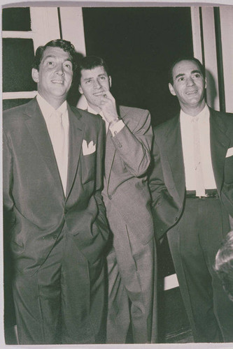 Comedians Dean Martin (left), Jerry Lewis (center) at the induction of Lewis as Honorary Mayor and Dean as Chief of Police of Pacific Palisades, Calif