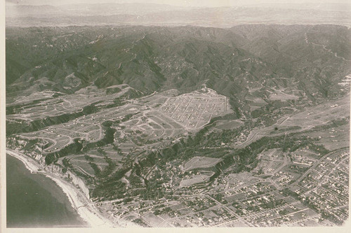 Aerial showing Pacific Palisades looking northeast from Santa Monica Canyon to the Santa Monica Mountains, December 16, 1927