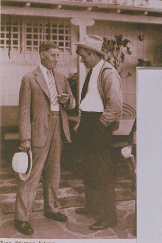 Will Rogers with Fred Stone at his Rustic Canyon ranch appearing in an article for "Pictorial California Magazine."