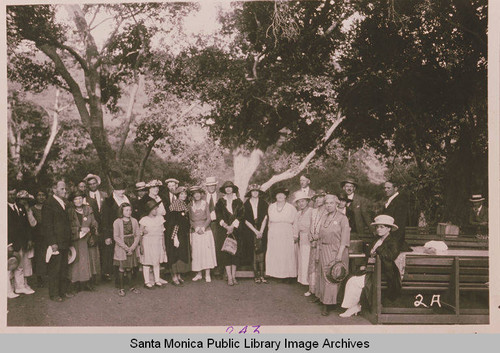 Gathering for a picnic at the Assembly Camp in front of oaks and sycamore trees, Temescal Canyon, Pacific Palisades, Calif