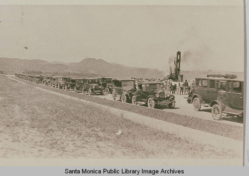 Cars lined up at the ceremonies marking the completion of grading on Beverly (Sunset) Blvd. from Los Angeles to Pacific Palisades, August 18, 1925