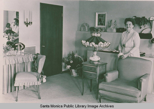 Woman with a handbag display, Pacific Palisades, Calif