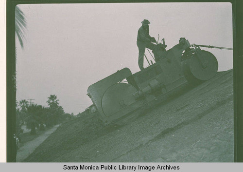 Compacting a playground at the Palisades Recreation Center near Swarthmore Avenue