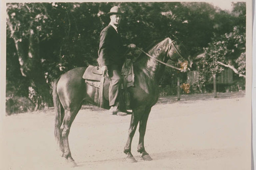 Clark Standiford (superintendent of construction) on horseback, Pacific Palisades, Calif