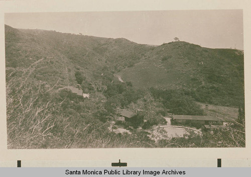 Assembly camp with Tabernacle at center left with a bell tower, Temescal Canyon, Calif
