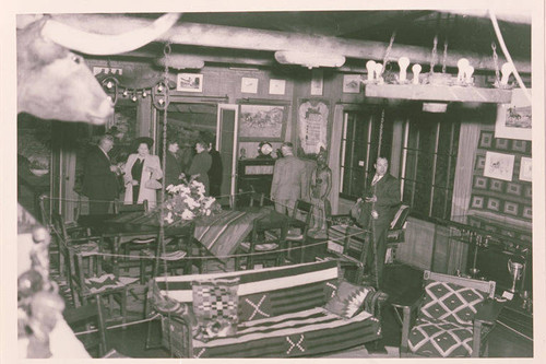 Visitors tour the interior of the guesthouse at Will Rogers Ranch State Park, Rustic Canyon, Calif