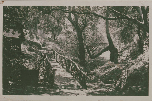 A trail and wood bridge railings in Temescal Canyon, Calif