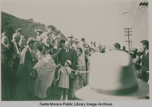 Governor Frank Merriam with Leo Carrillo at the ribbon cutting ceremony, Opening Day of the new and improved Pacific Coast Highway, Calif