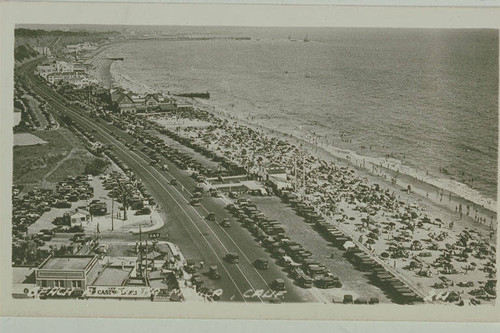 A crowded Will Rogers State Beach along Pacific Coast Highway looking south to Santa Monica, Calif