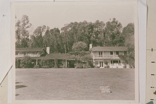 The main house and fenced in grounds at Will Rogers State Park, Rustic Canyon, Calif