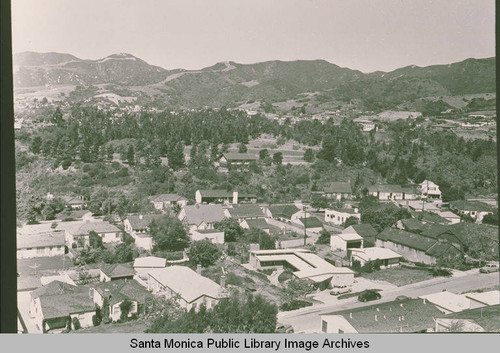 Looking down on houses near Haverford Avenue with Temescal Canyon in the background