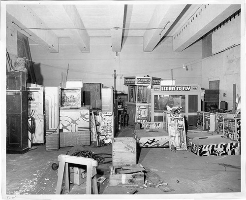 Storage area in Pacific Ocean Park construction zone with arcade games, arcade equipment, and change booth, Santa Monica, Calif