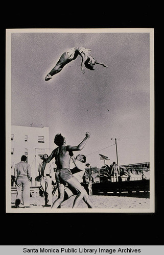 Lee Thompson and Russ Saunders throwing Paula Dell on Muscle Beach ...