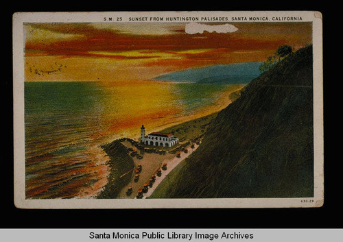 View of the lighthouse from the Huntington Palisades at sunset