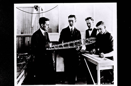 Donald W. Douglas and Glenn Martin with model airplane at the Martin plant