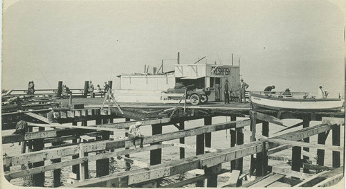 Fresh Fish stand and the Winifred fishing boat on the Ocean Park Pier, Santa Monica, Calif