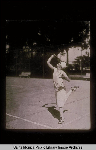 Clara B. Bartlett playing tennis at Lincoln Park, Santa Monica, Calif