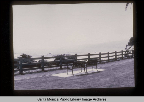 Benches facing the ocean in Palisades Park, Santa Monica, Calif