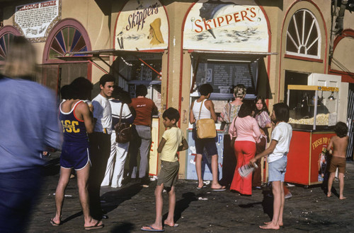 People waiting in line at Skippers on Santa Monica Pier