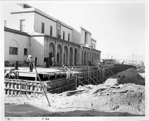 Municipal Auditorium under construction in the process of being transformed into the Westinghouse Enchanted Forest building at Pacific Ocean Park in January 1958, Santa Monica, Calif