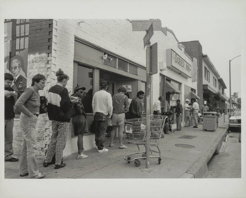 People lined up outside Sober Inn (program of CLARE Foundation) on Pico Boulevard, Santa Monica, Calif